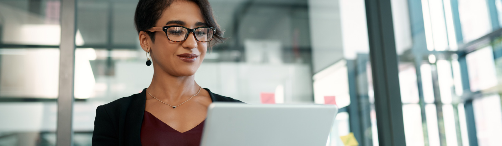 Woman using tablet in office setting